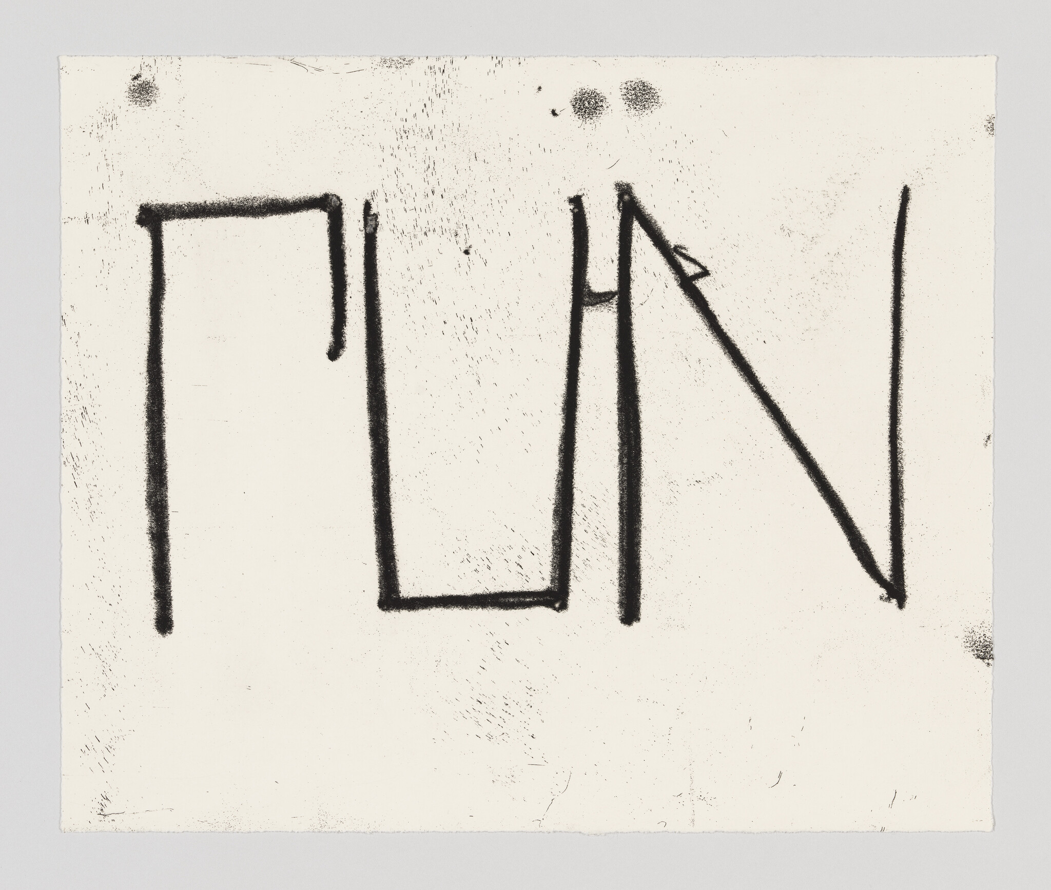 The word run in thin, capital, black letters centered across off white paper with black smudge marks and finger prints. 