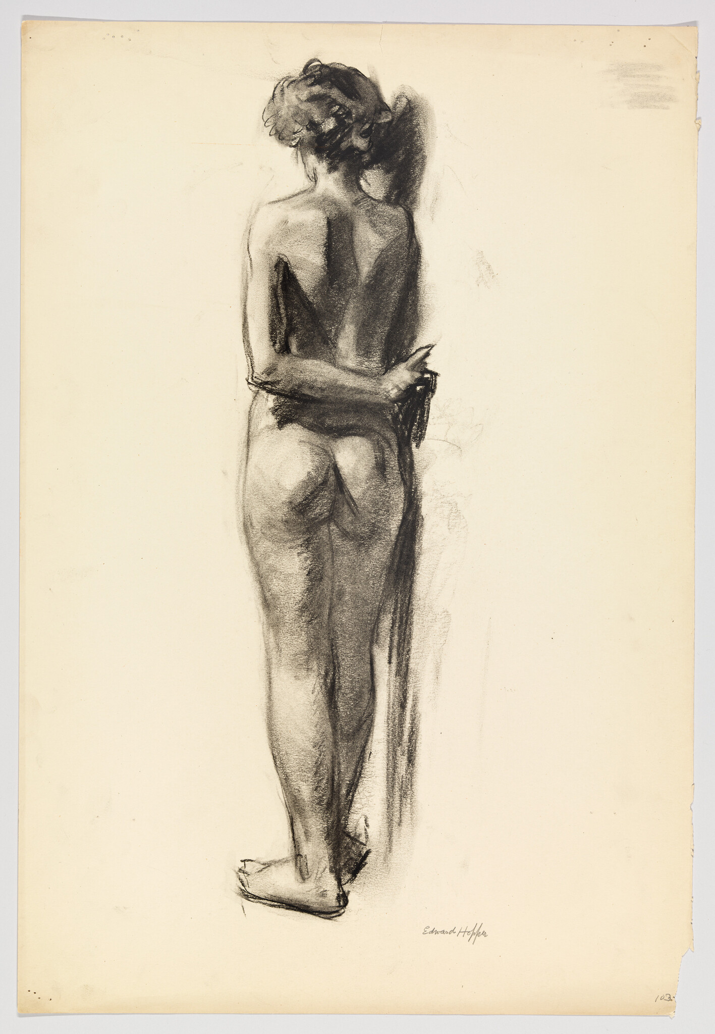 A charcoal sketch of a standing nude woman seen from the back holding a draped cloth.
