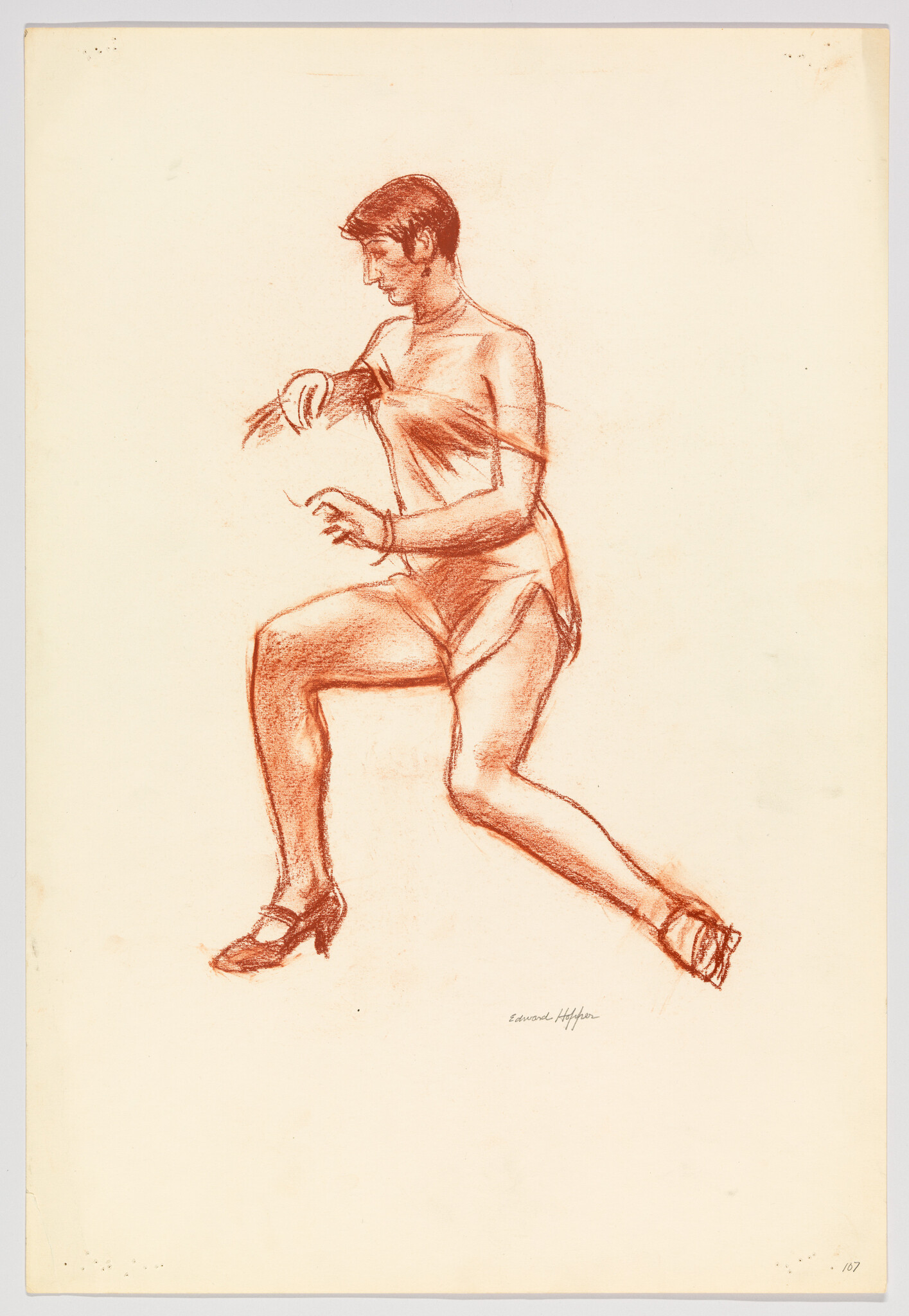 A dancer mid-step with one knee raised and arms poised.