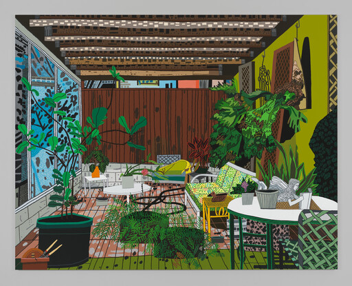 A sunlit enclosed patio filled with potted plants, a patterned sofa, and tables for relaxing.