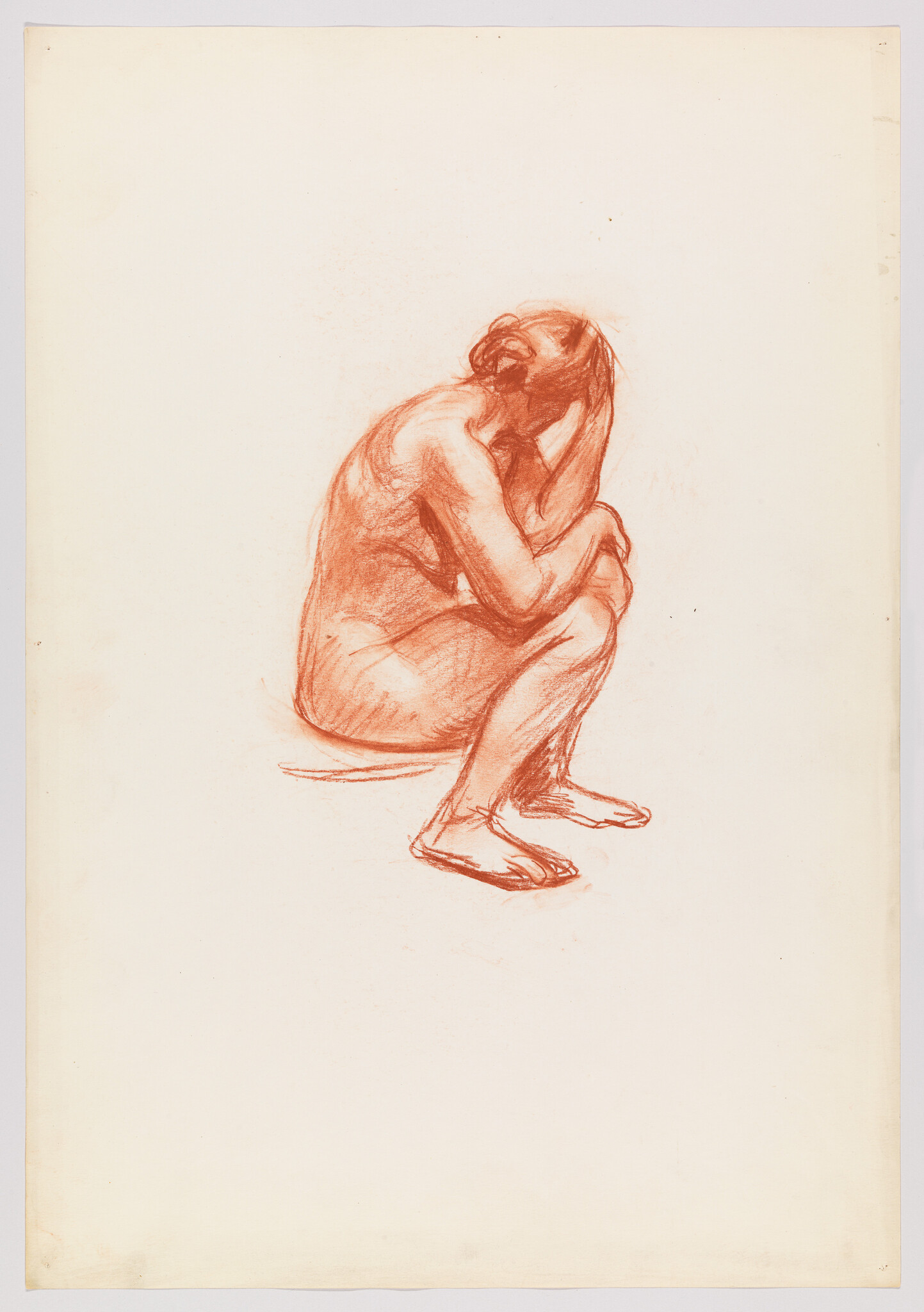 A red chalk sketch of a nude woman sitting on her heels with hands covering her face.