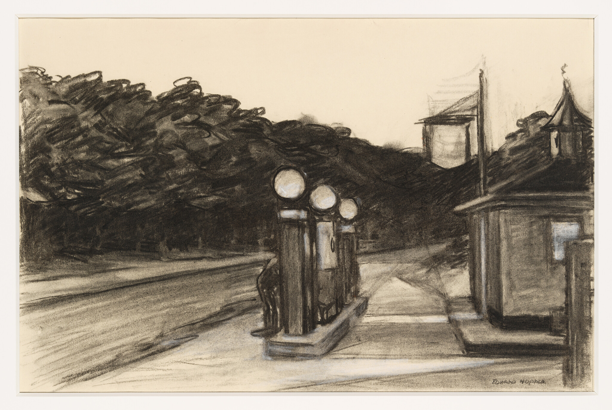 Three vintage gas pumps stand on a roadside island near a small building under dark trees.