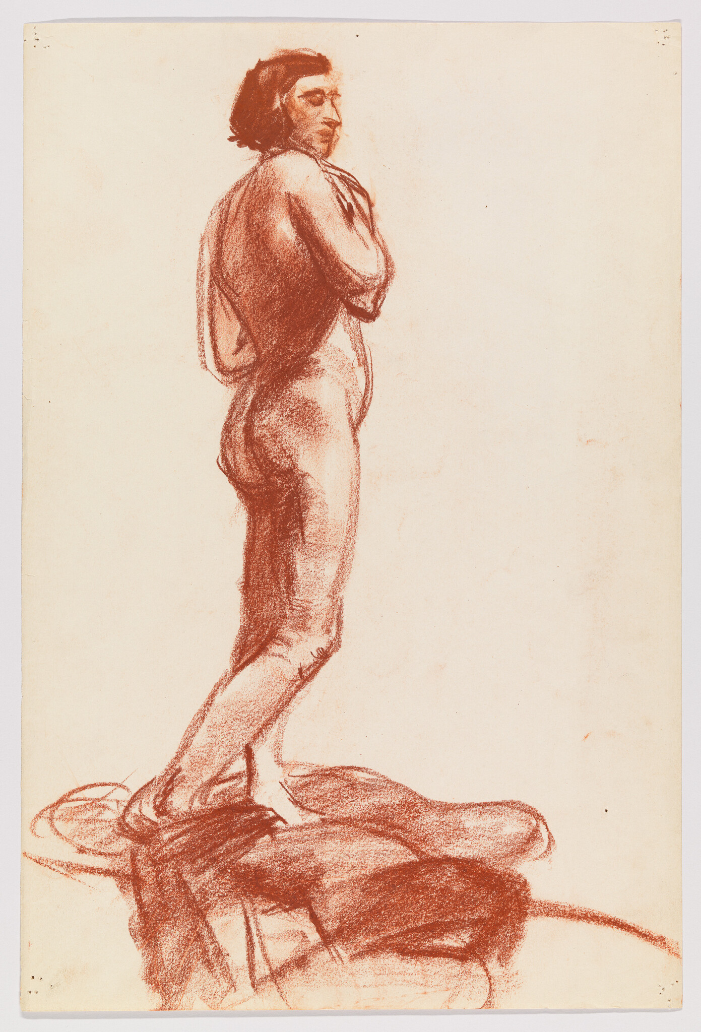 A standing nude woman looks over her shoulder with hands near her chest on draped fabric.