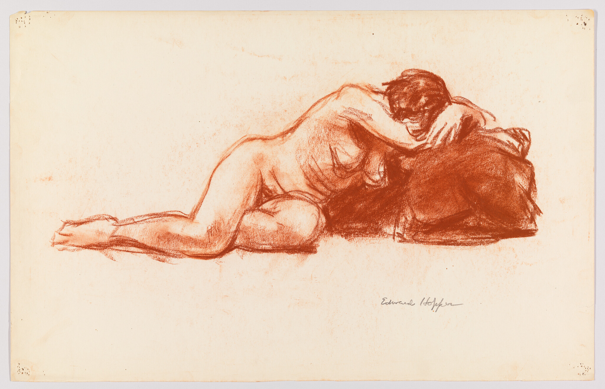 Nude woman reclining on her side, leaning forward onto a dark cushion.