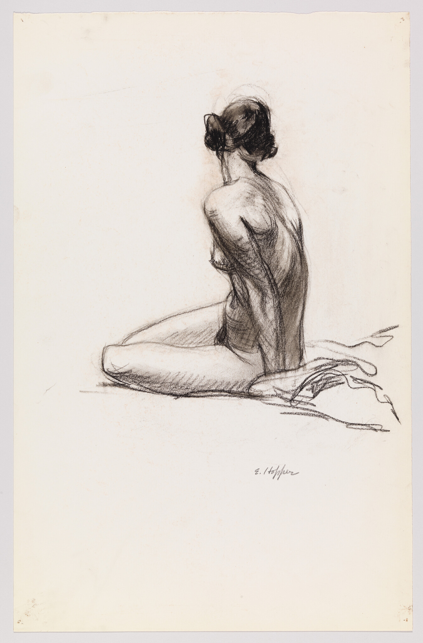 A charcoal sketch of a seated nude woman turned away, with knees bent and hands behind.
