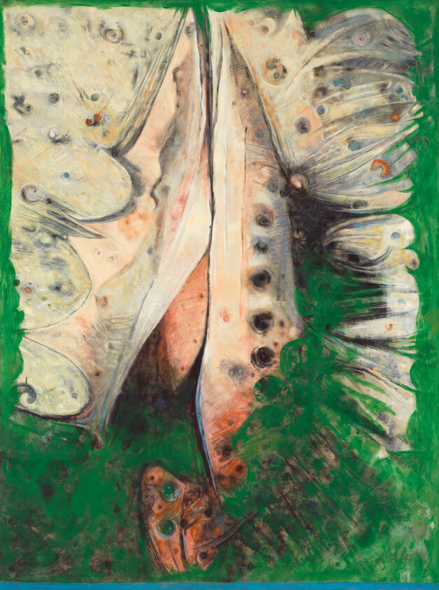 A close-up of a pale butterfly wing with dark spots against a vivid green background.