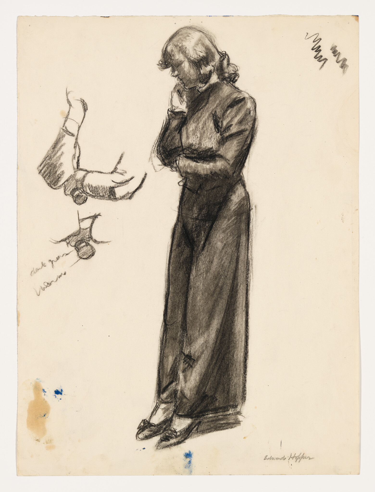 A sketch of a woman standing in profile, looking down at a piece of paper she is holding in her right hand. She appears contemplative or focused, with her left hand raised to her chin. The drawing is rendered in charcoal with some smudging to create shading and depth, and there are a few spots of blue and brown discoloration on the paper. The artist's signature is visible at the bottom right.