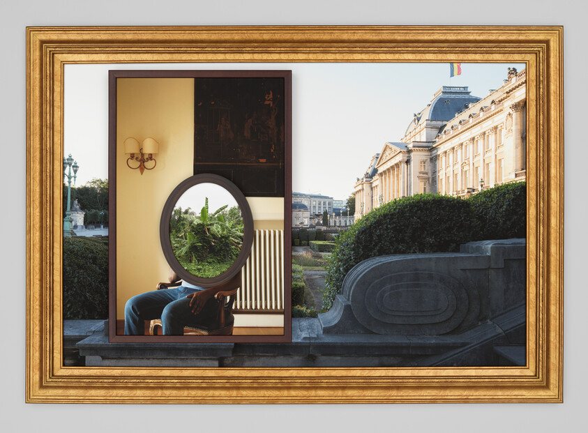 Framed surreal scene of a seated person whose head is a round mirror reflecting greenery and a palace.
