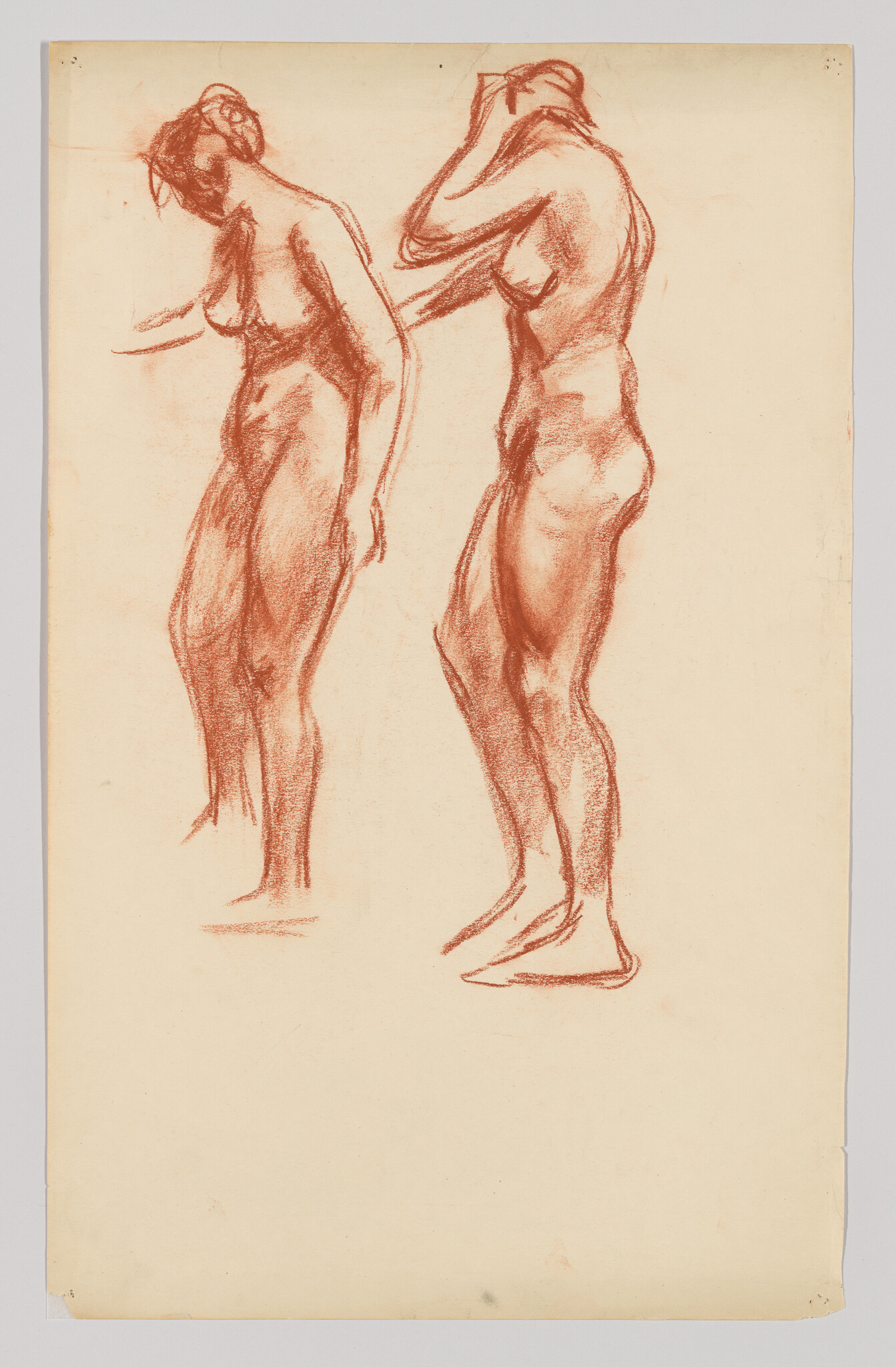 Two standing nude women sketched in red chalk, one lowering her head and the other fixing her hair.