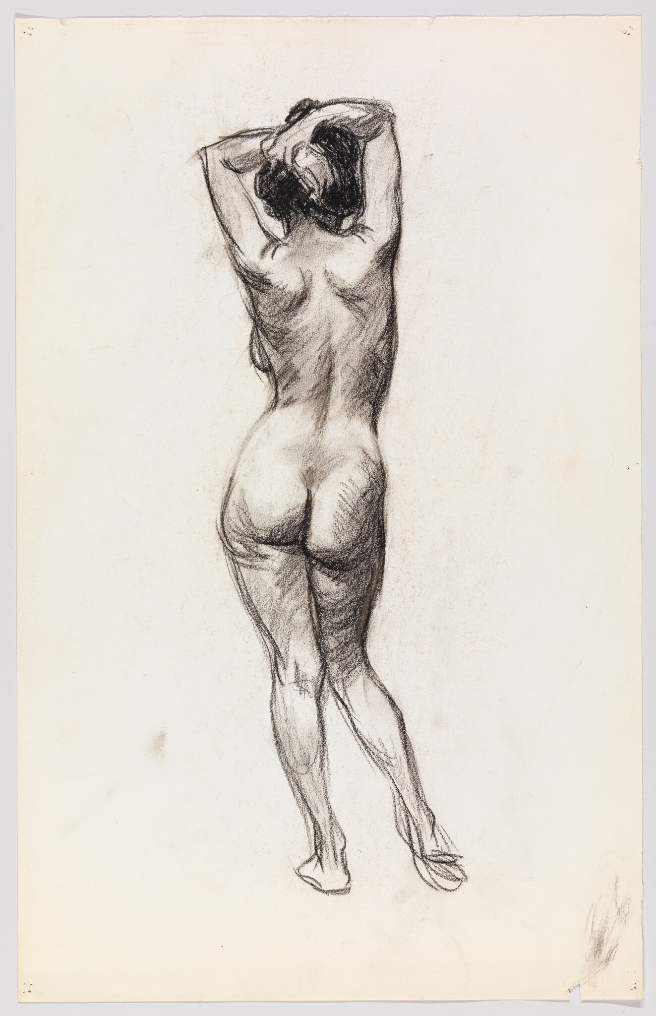 Nude woman standing with arms raised behind her head, viewed from the back.
