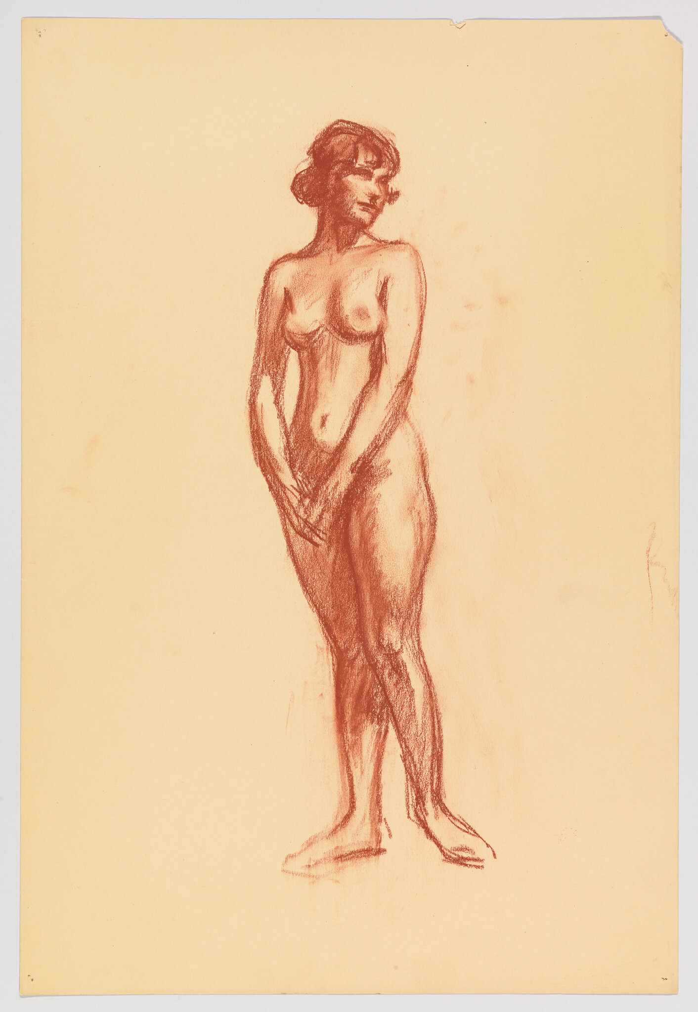 A red chalk sketch of a standing nude woman with hands clasped and head turned to the right.