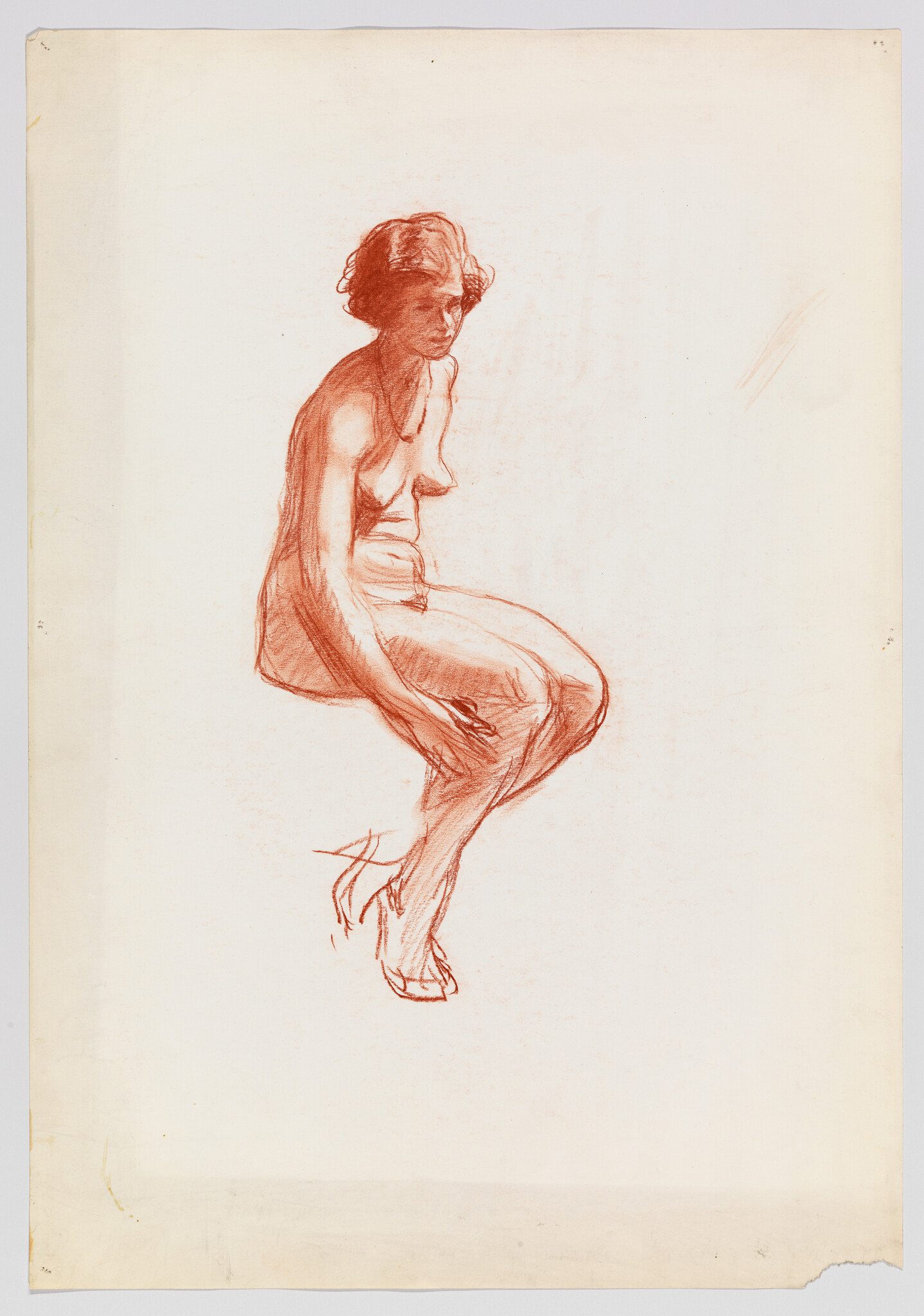 A red chalk sketch of a seated woman turning slightly with legs crossed and head bowed.