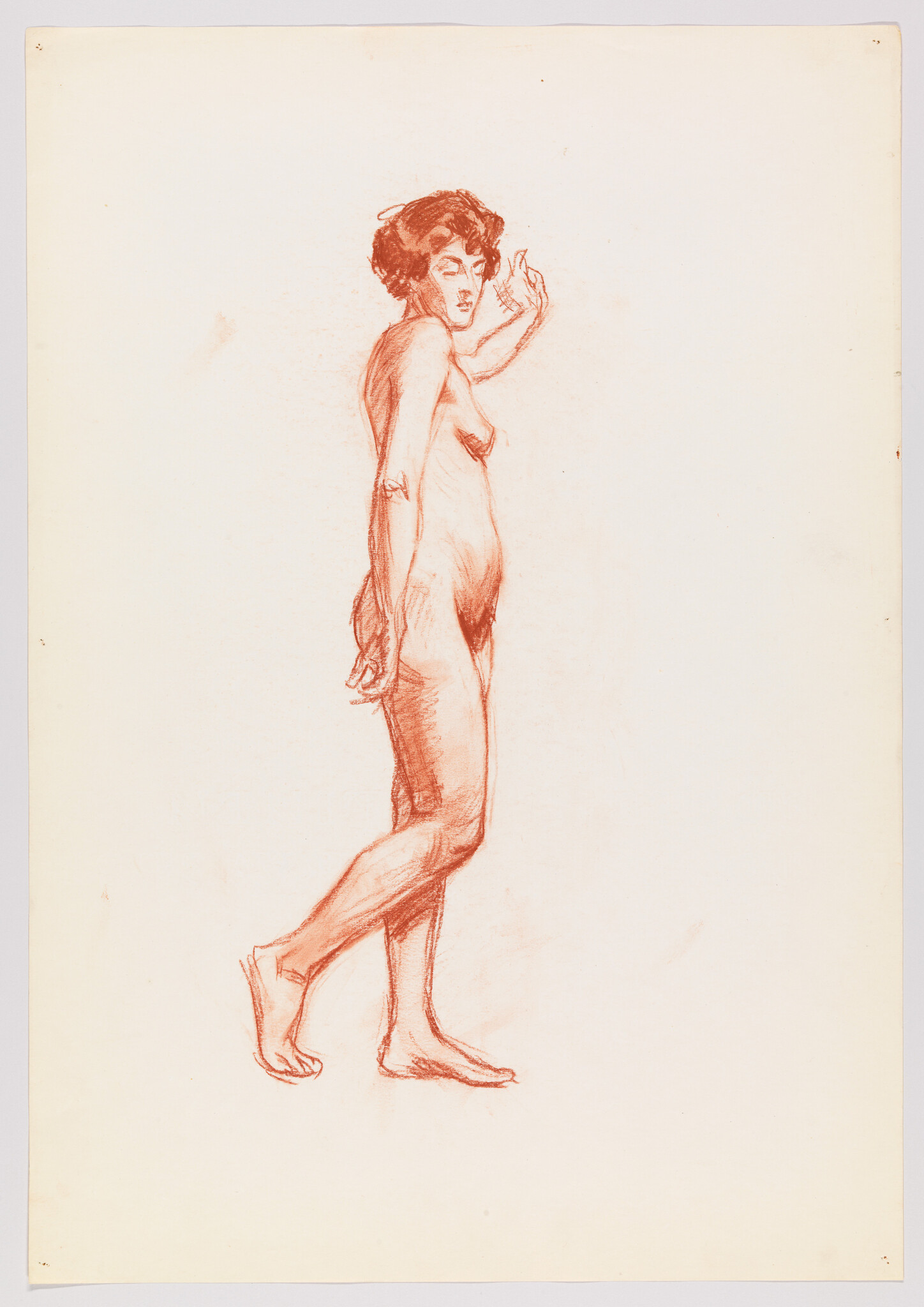 A red chalk sketch of a standing nude woman turning her head with one arm raised.