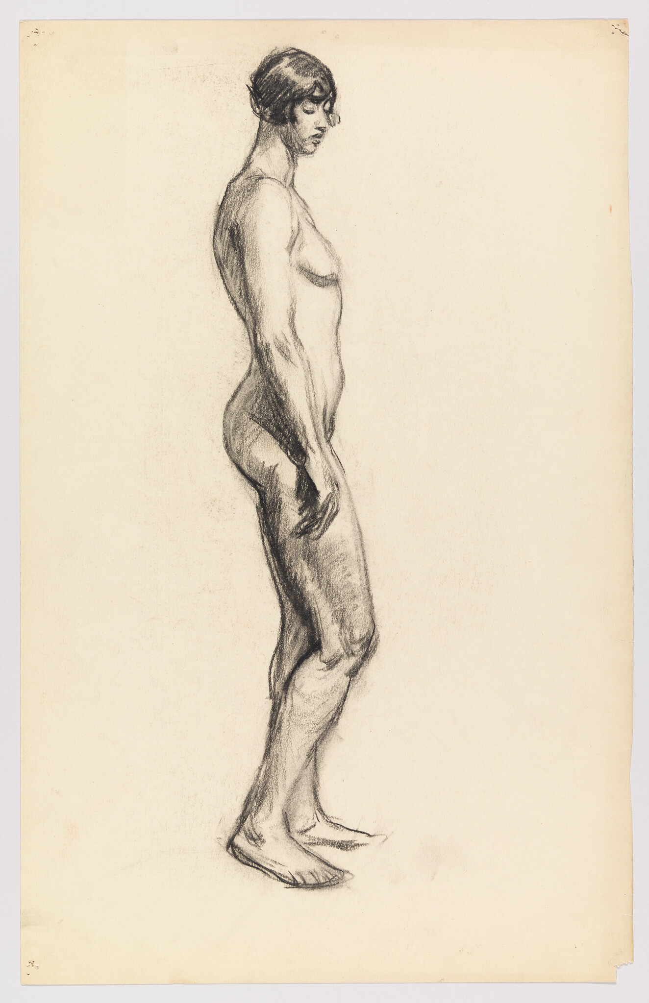 A charcoal sketch of a standing nude woman in profile, looking downward with relaxed hands.
