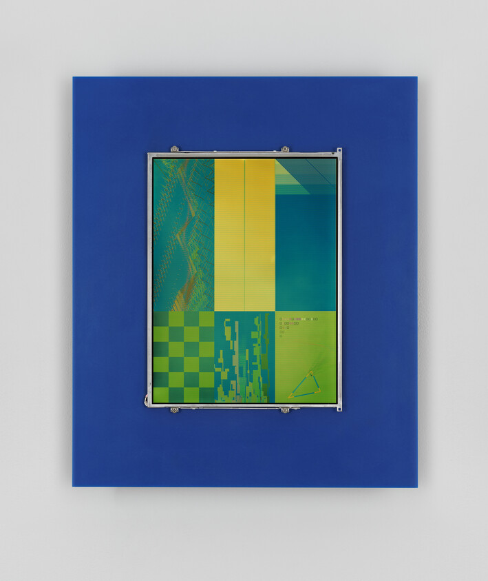 Framed abstract panel with green and yellow geometric patterns mounted on a blue board.