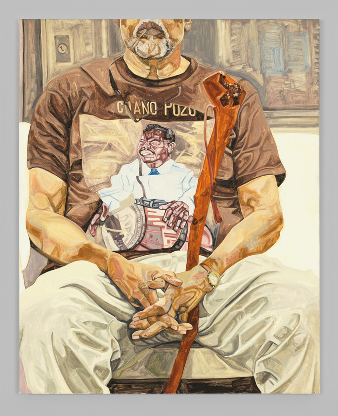 Painting of a seated man with a distorted face, wearing a shirt with a graphic of another man, holding a cane.