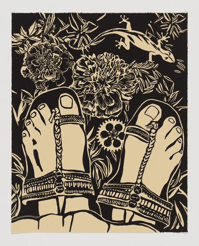 Feet in braided sandals standing among flowers with a small lizard crawling nearby.