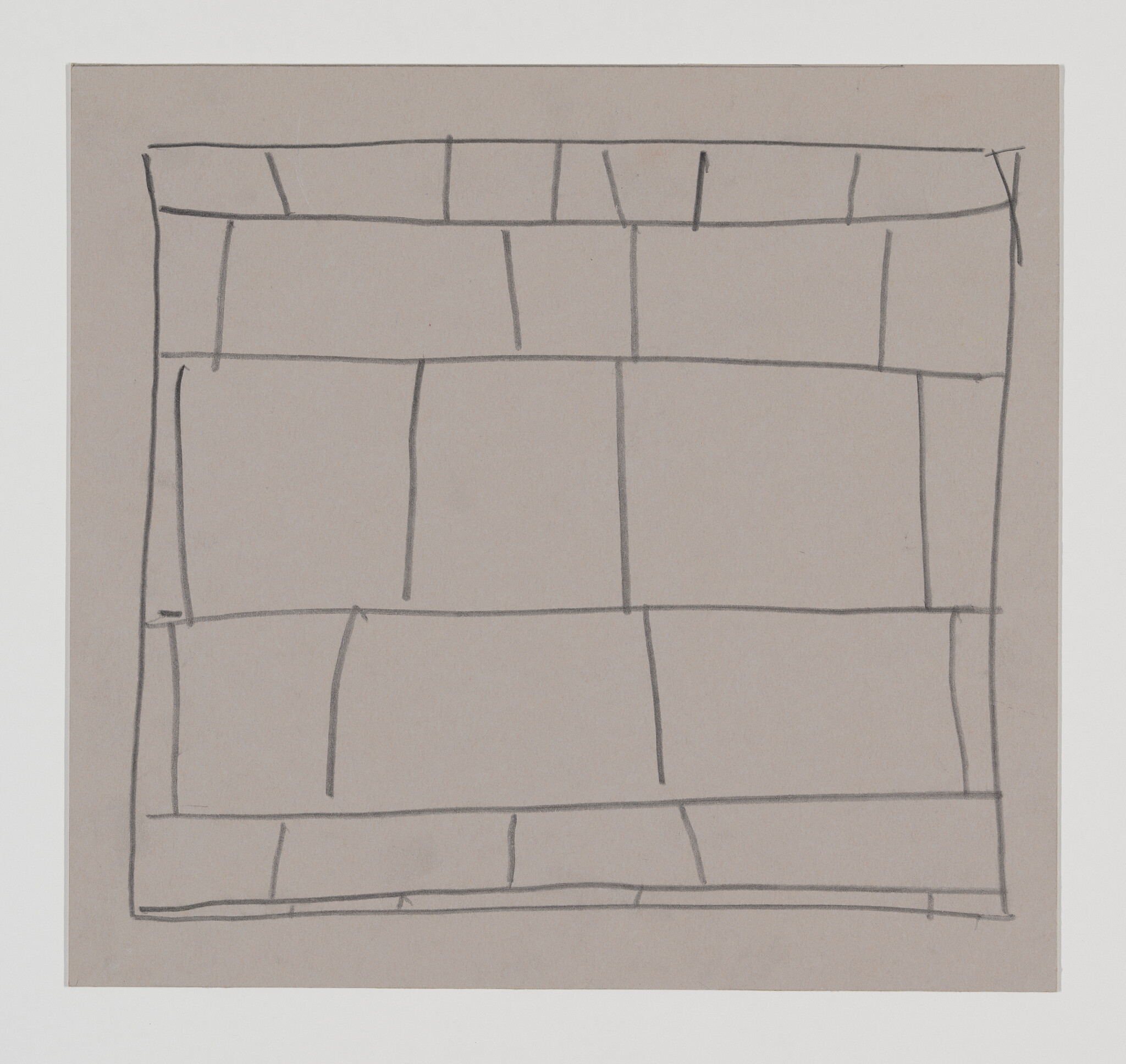 Hand-drawn pencil grid of staggered rectangular blocks on gray paper resembling a simple brick pattern.