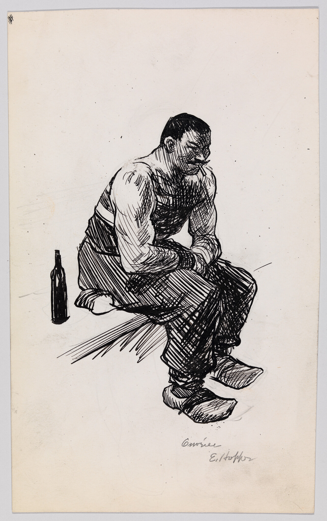A tired man sits hunched on a bench with hands clasped and a bottle beside him.