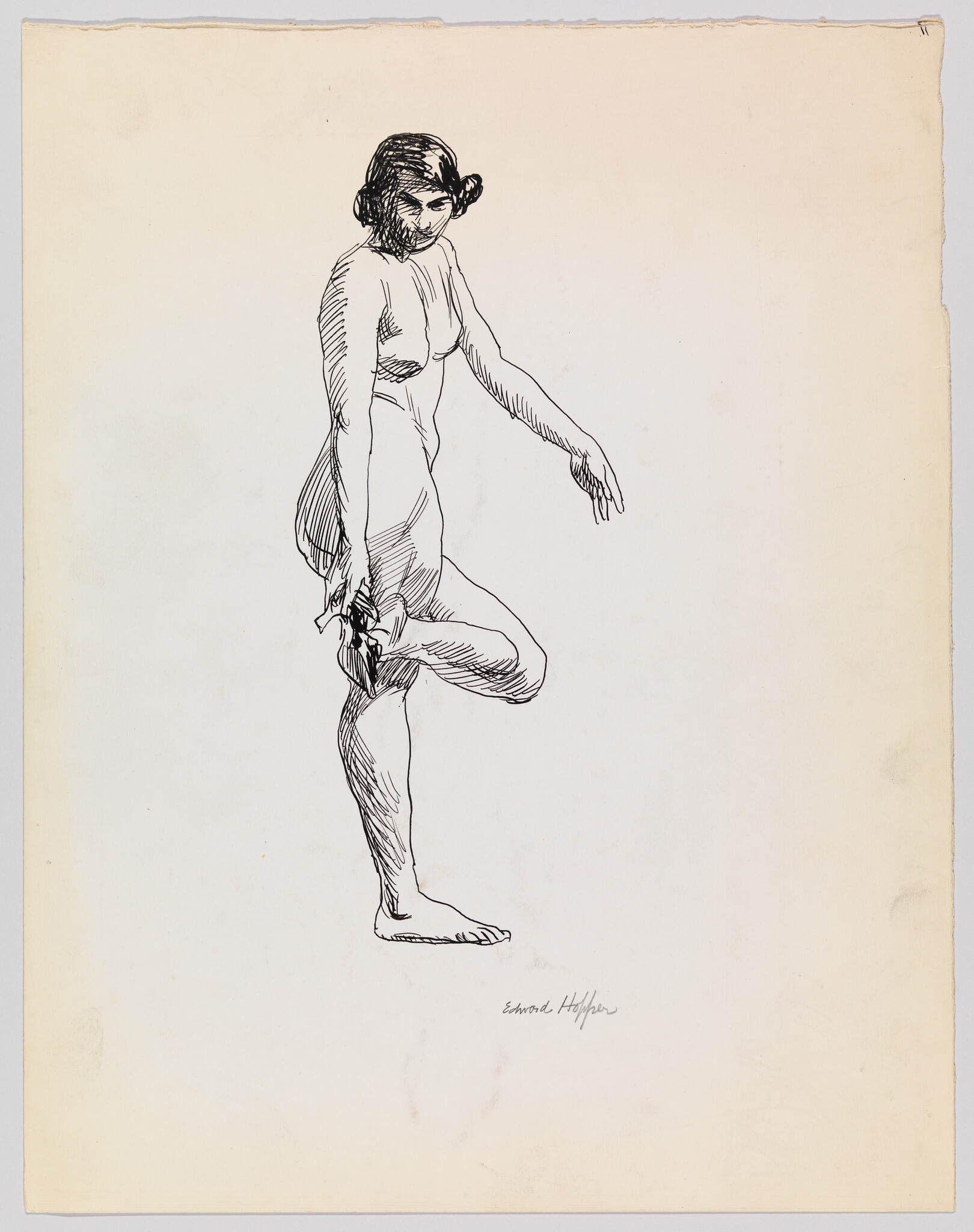 A nude woman balancing on one leg while holding her raised foot.