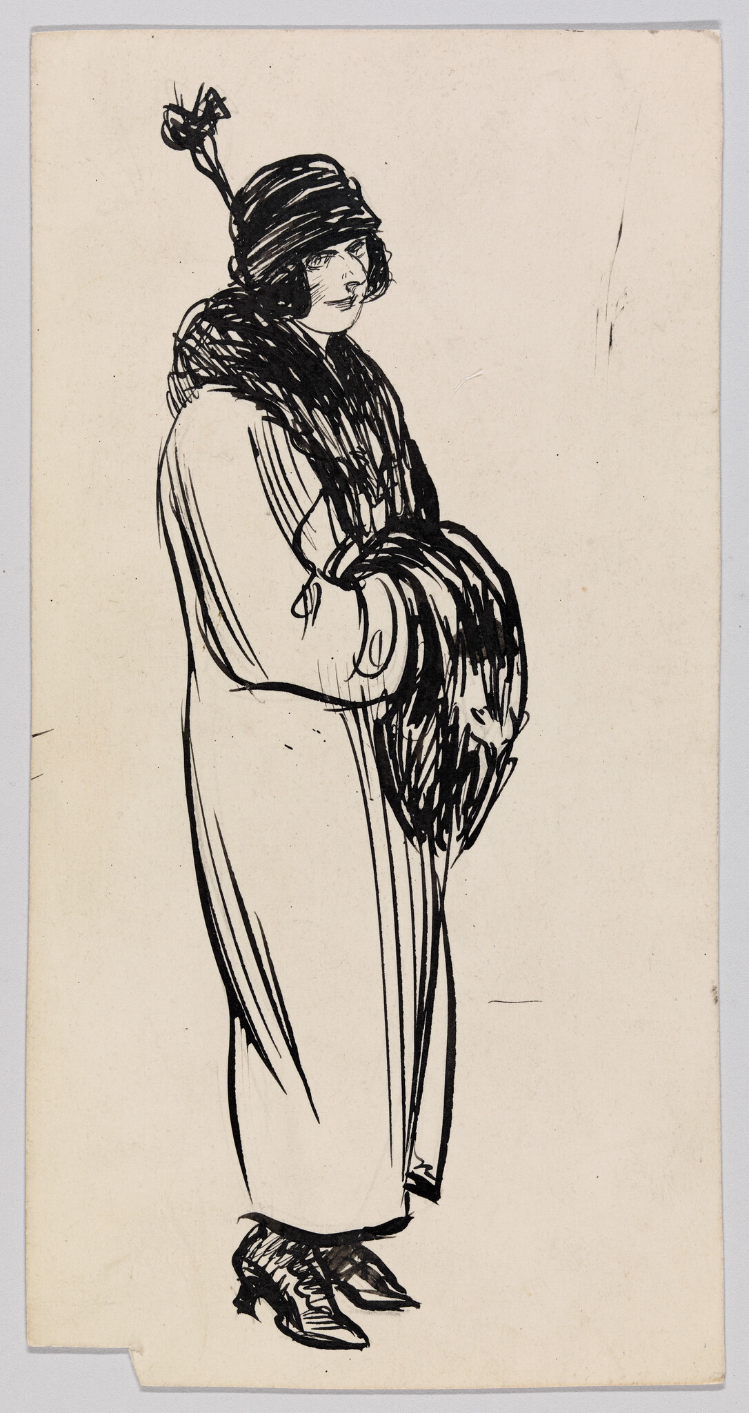 Woman in long coat and cloche hat holding a fur muff, standing in profile.