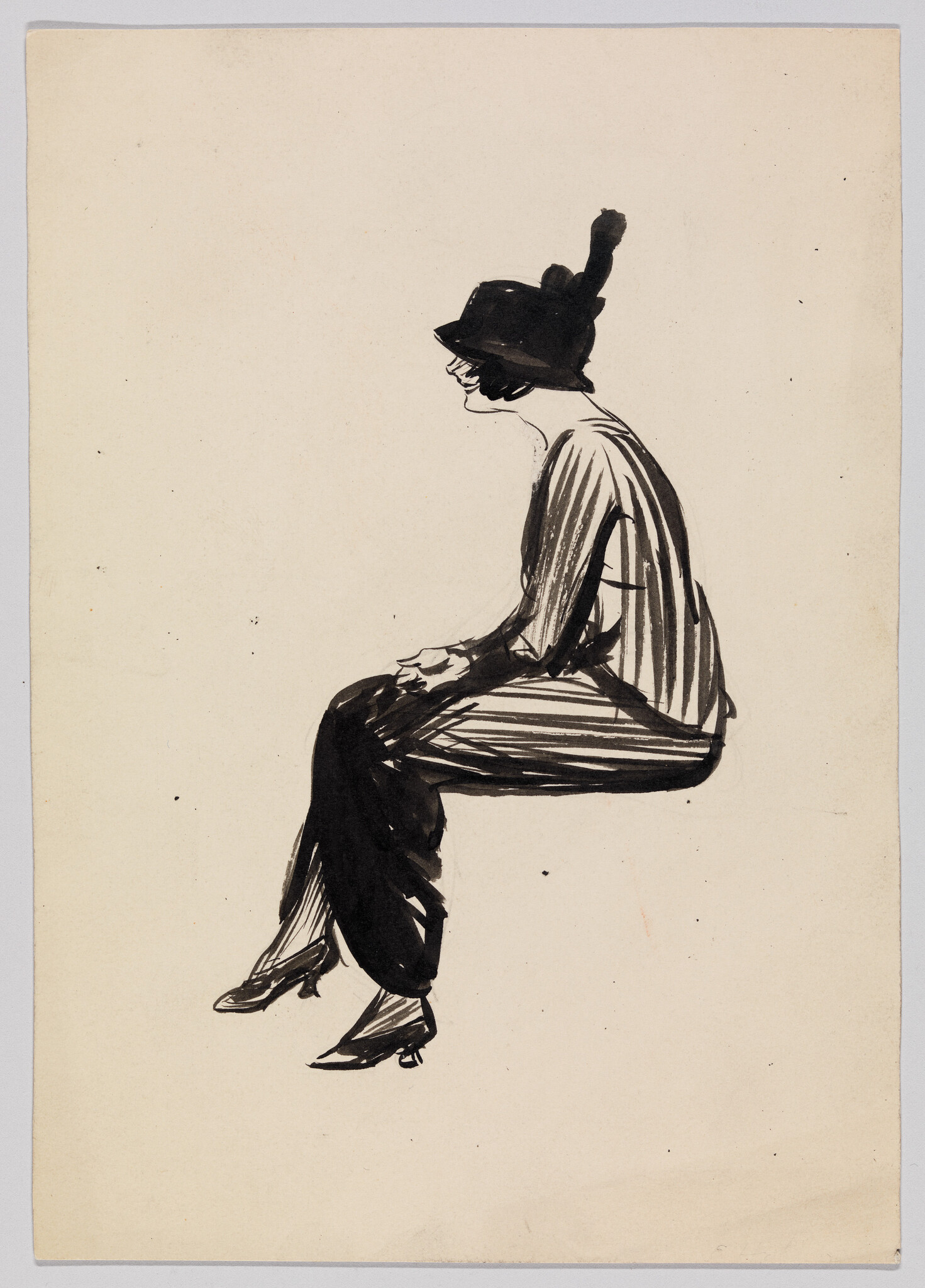 A woman wearing a hat and striped dress sits sideways with hands clasped on her lap.