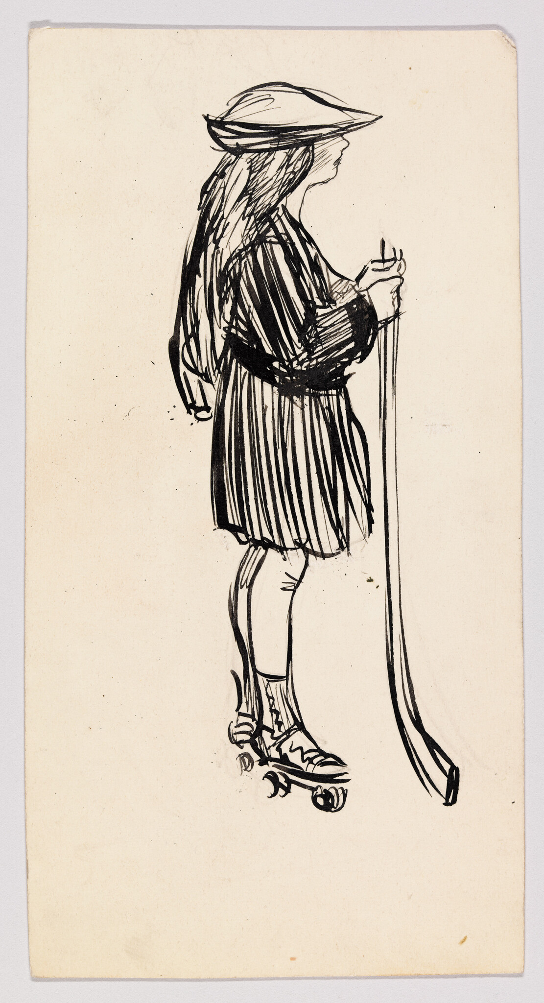 A young girl wearing a hat and striped dress stands on roller skates holding a long stick.