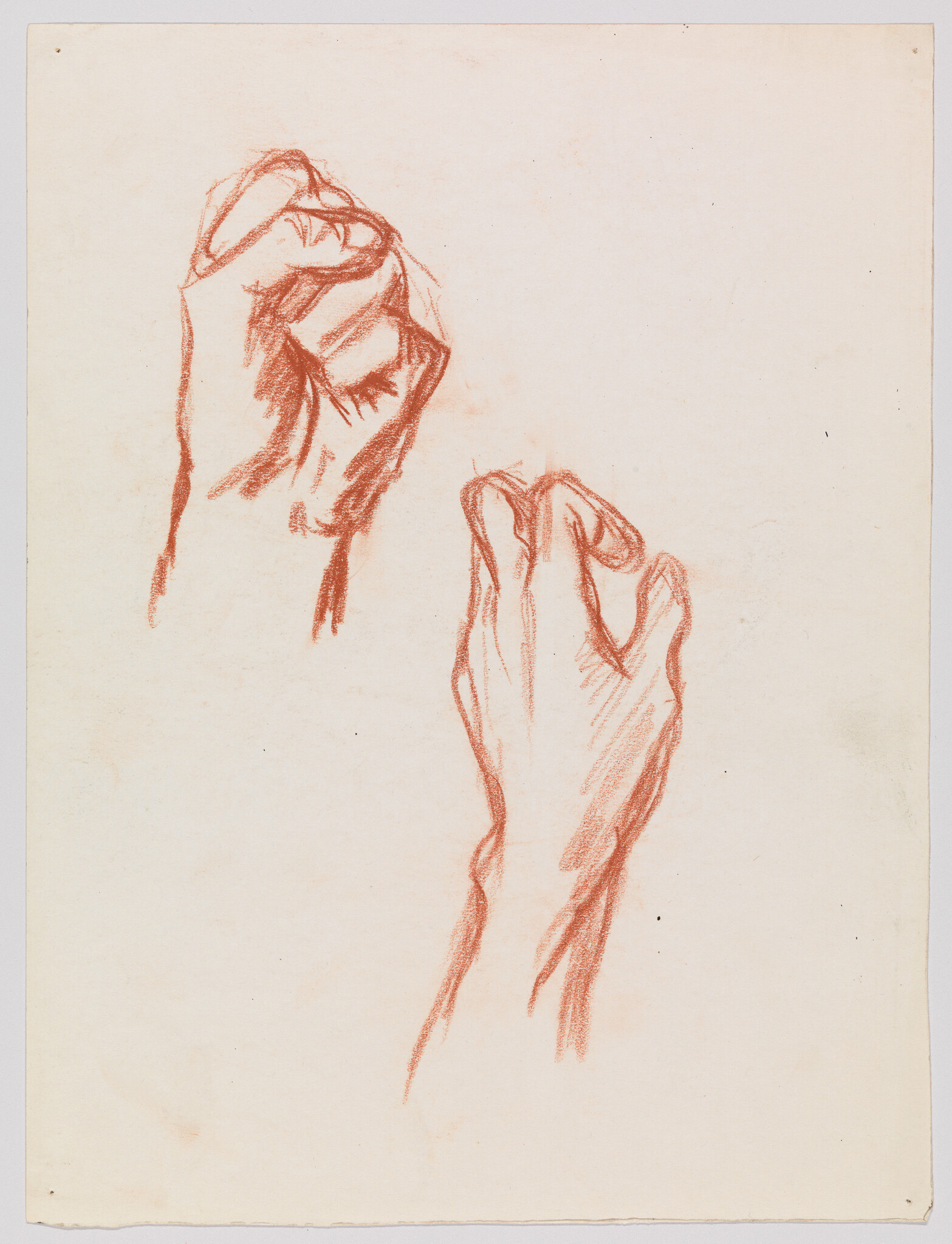 Two red chalk studies showing a clenched fist and a pinching hand gesture.