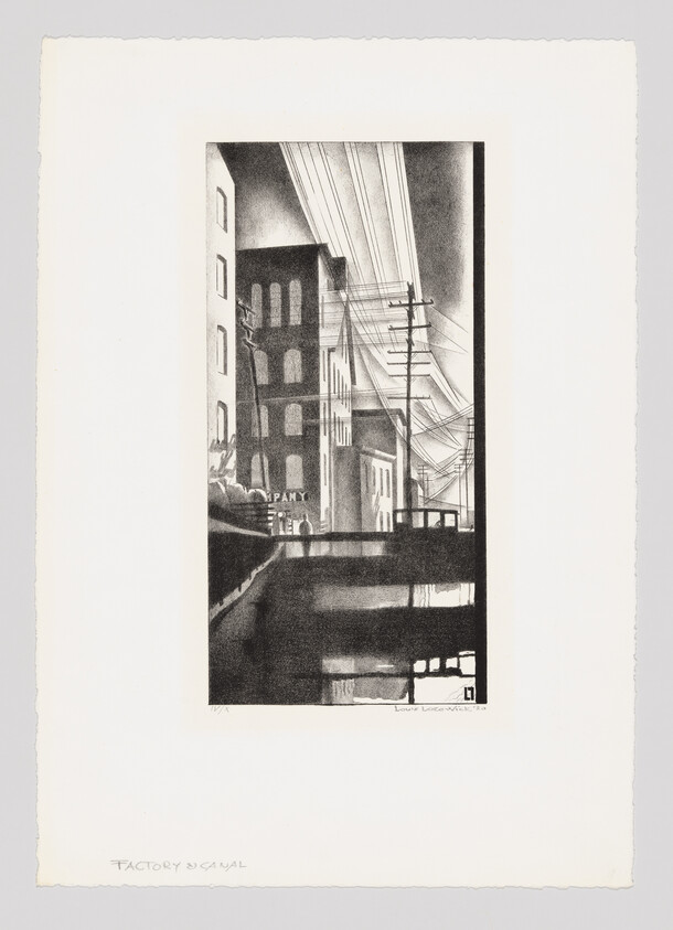 A narrow industrial alley with factory buildings, dense overhead wires, and reflections in a canal.