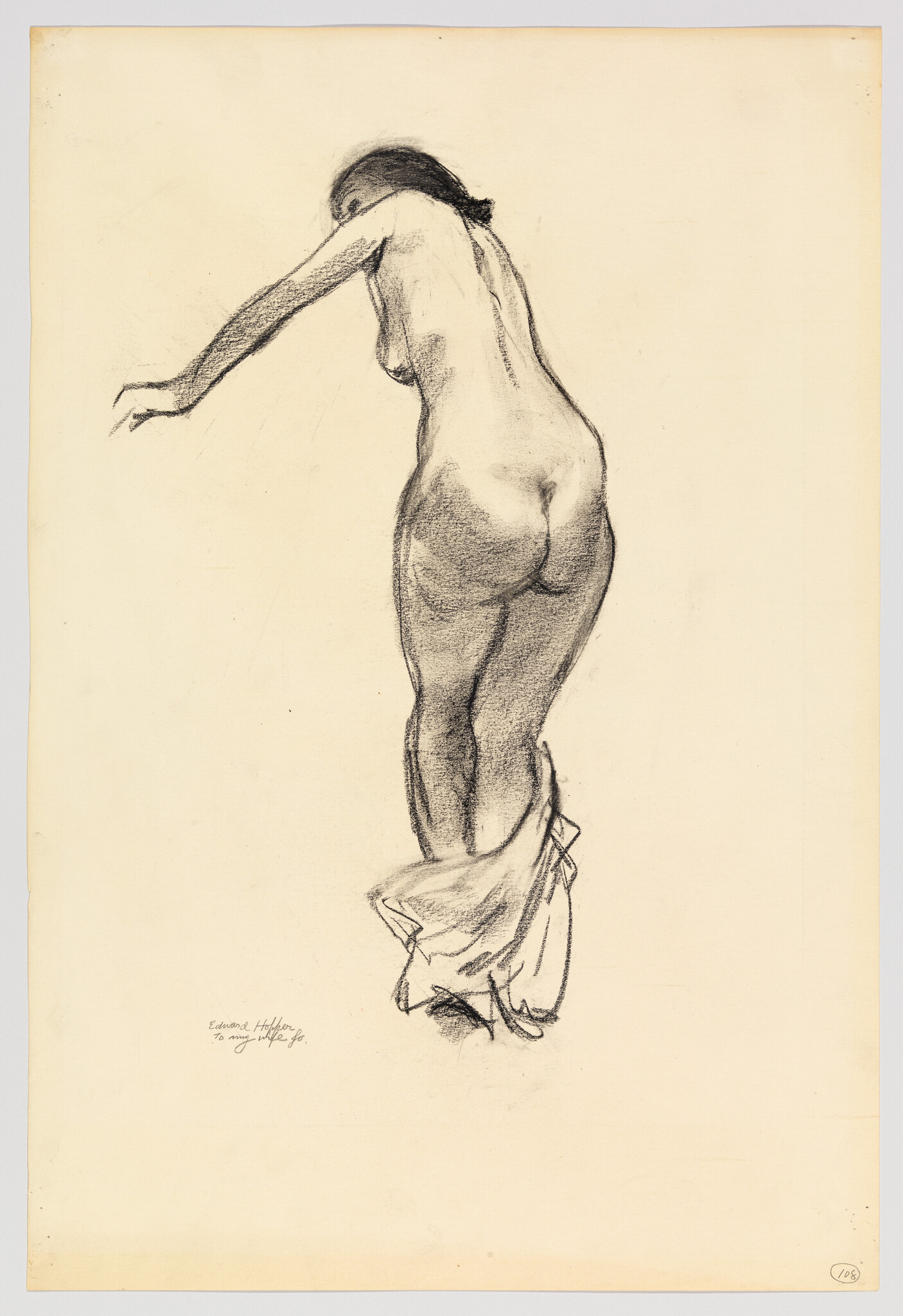 Nude woman seen from behind leaning forward while stepping out of draped cloth.