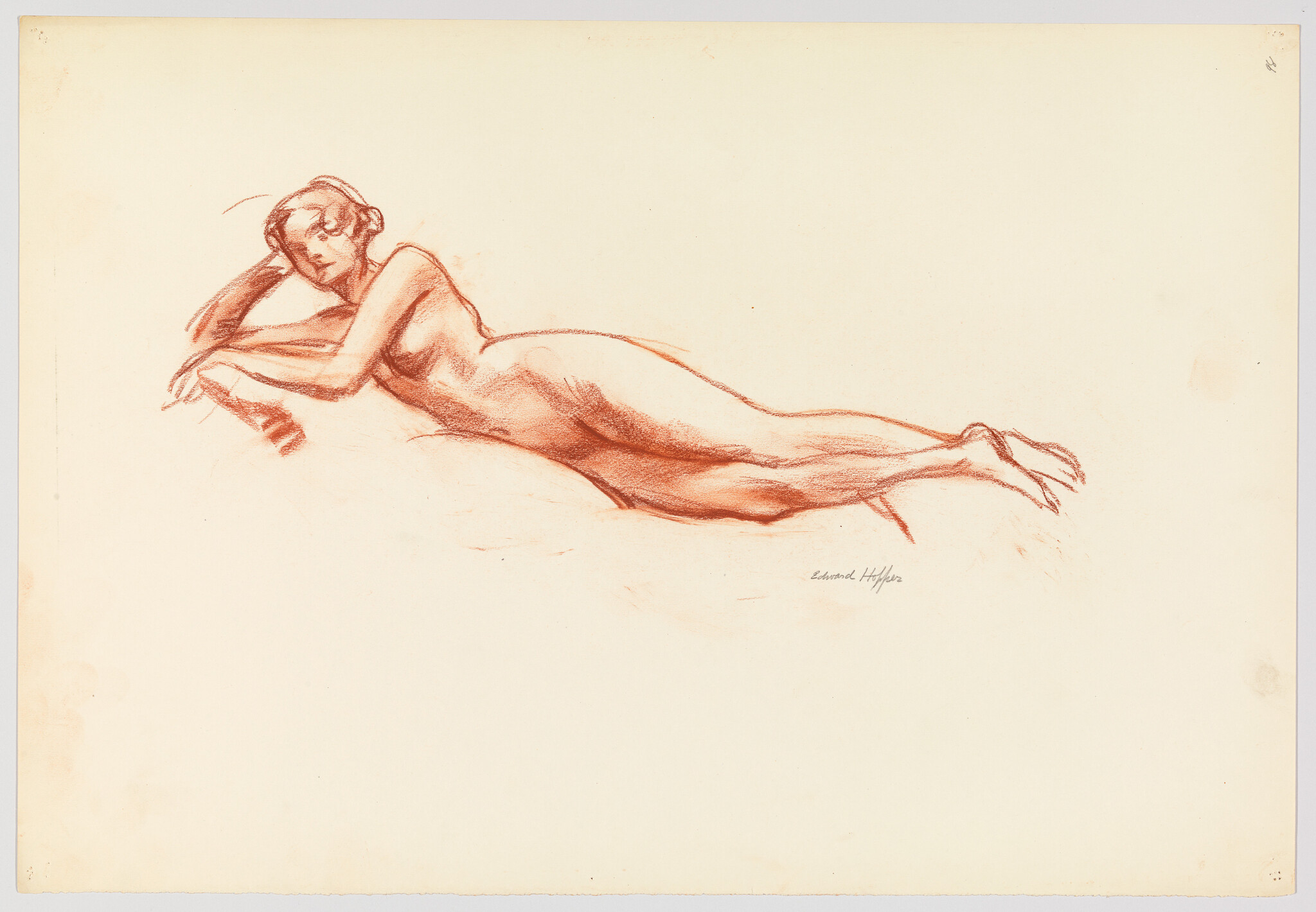 Reclining nude woman drawn in red chalk, propped on her left elbow and resting.