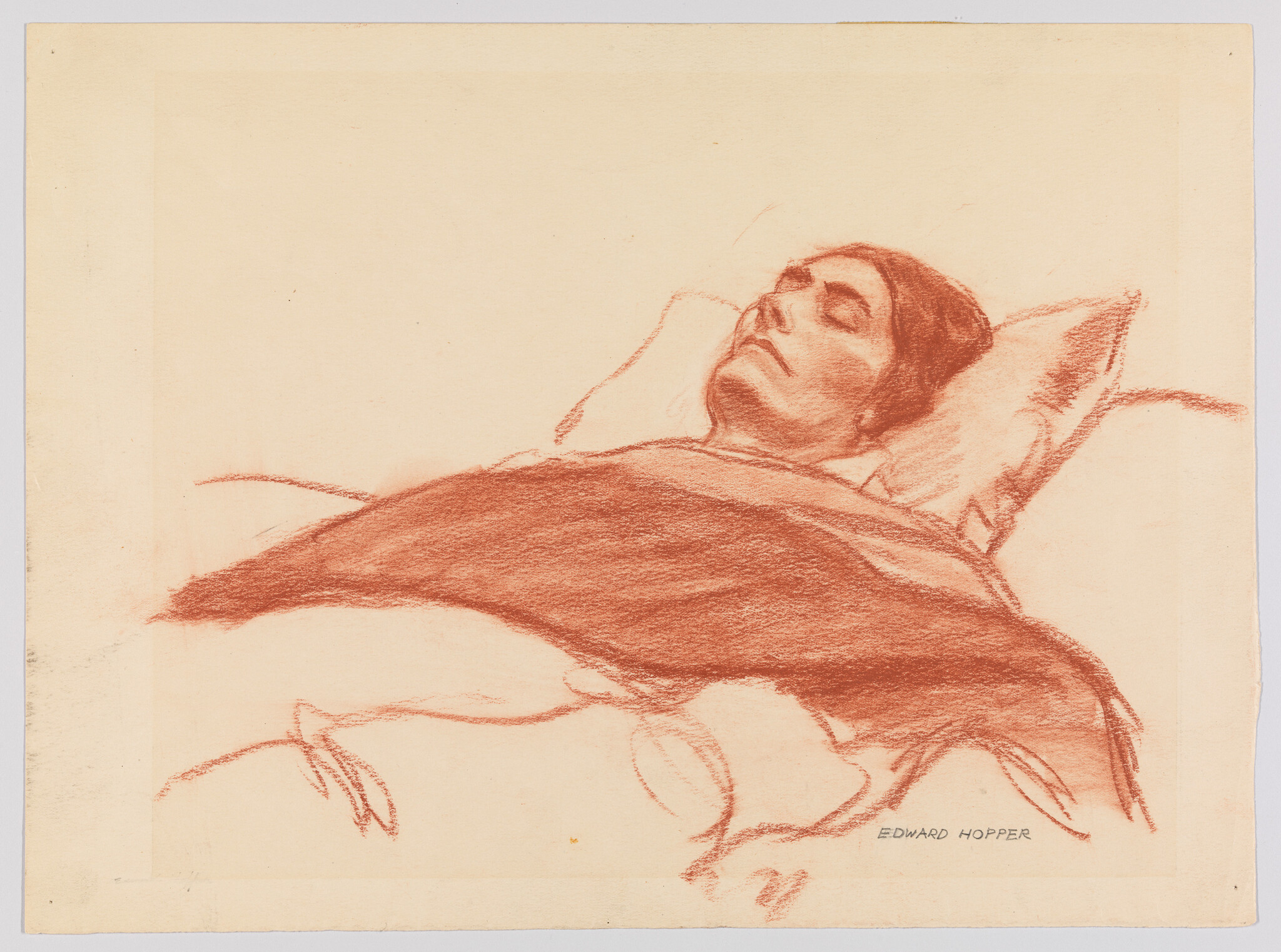 A woman lies in bed with eyes closed, covered by a blanket and resting.