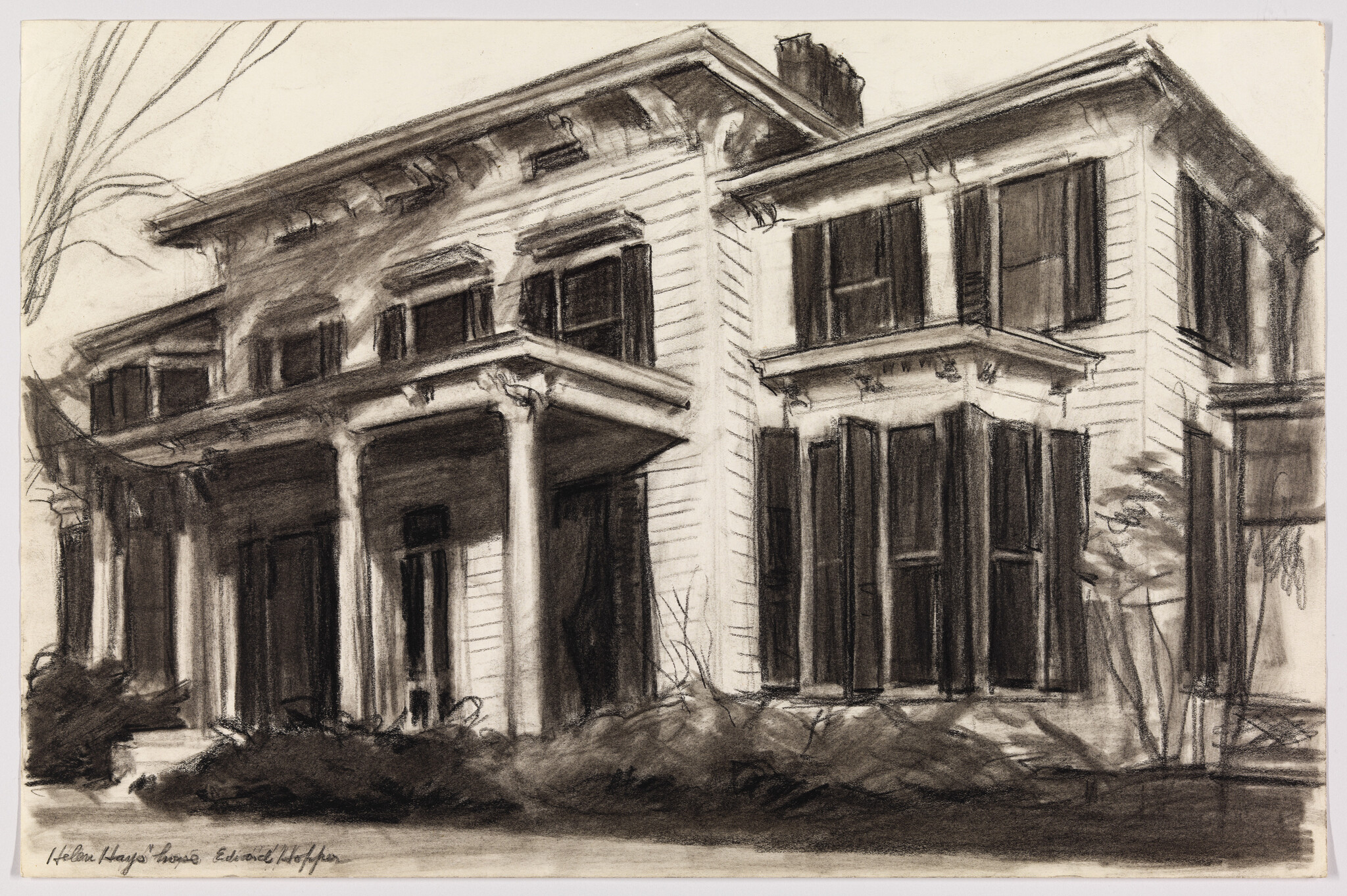 Large two-story house with front porch, classical columns, and tall shuttered windows.