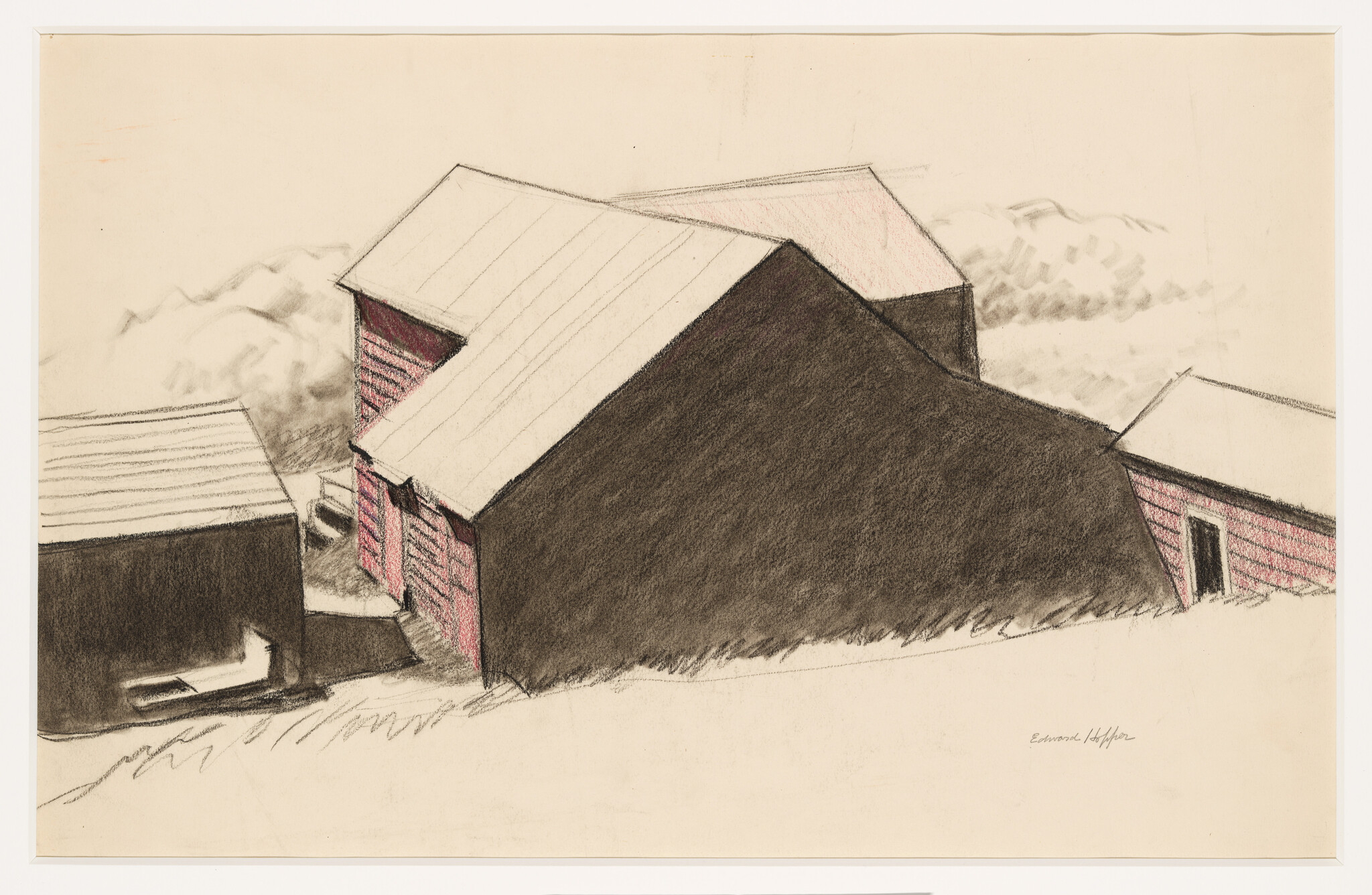 Three connected barns with dark roof shadows and red wooden siding on a hillside.