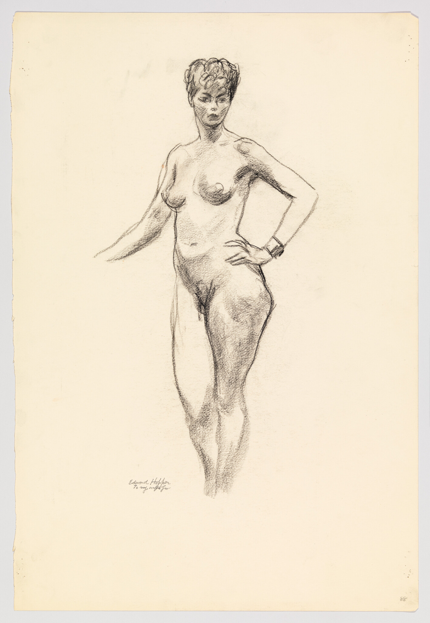 Nude woman standing with one hand on her hip in a charcoal figure drawing.