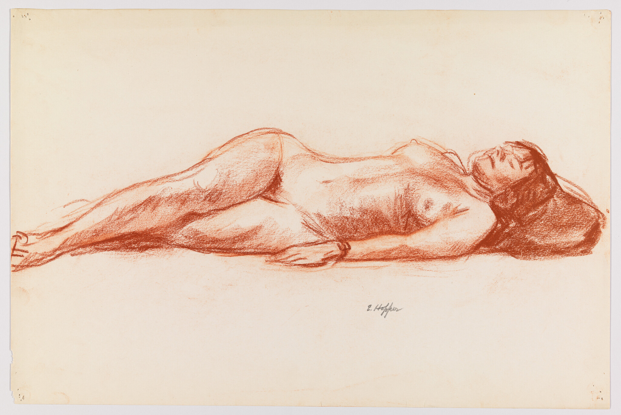 A sanguine drawing on toned paper depicting a reclining nude female figure, viewed from the side with her head resting on her bent arm and her legs slightly bent. The artist's signature is visible at the bottom right.