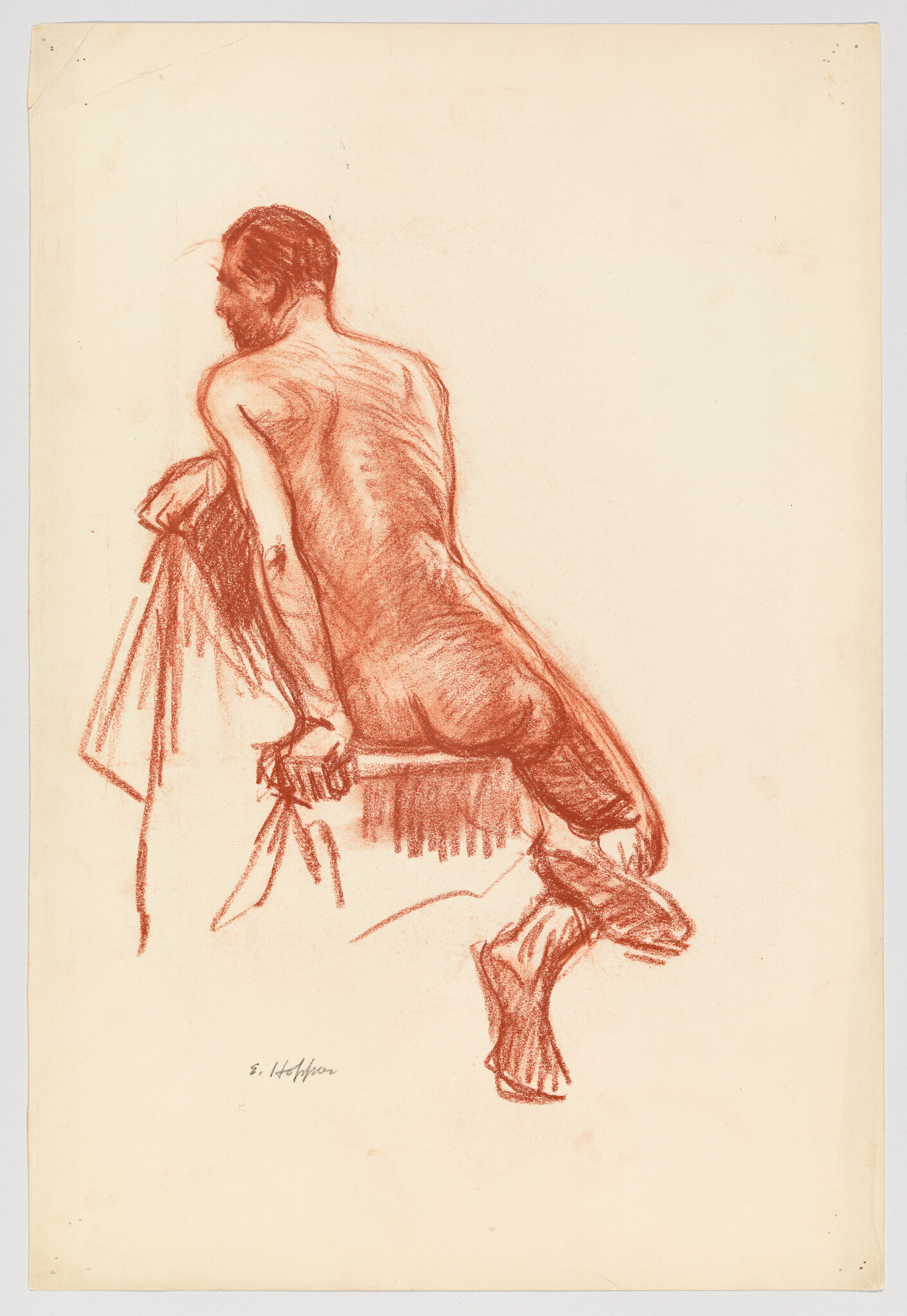 Nude man seated on a bench, leaning forward with hands gripping a draped cloth.