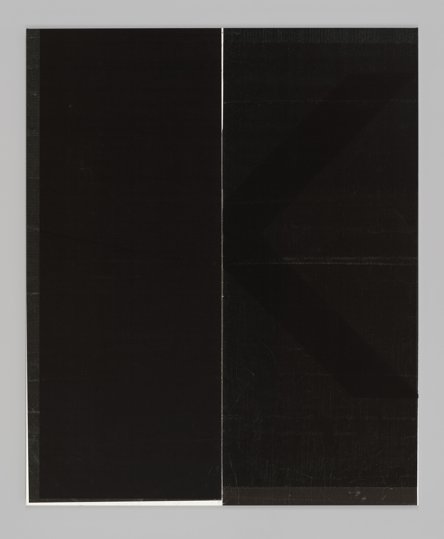 Two tall black panels separated by a thin vertical white line on a gray background.