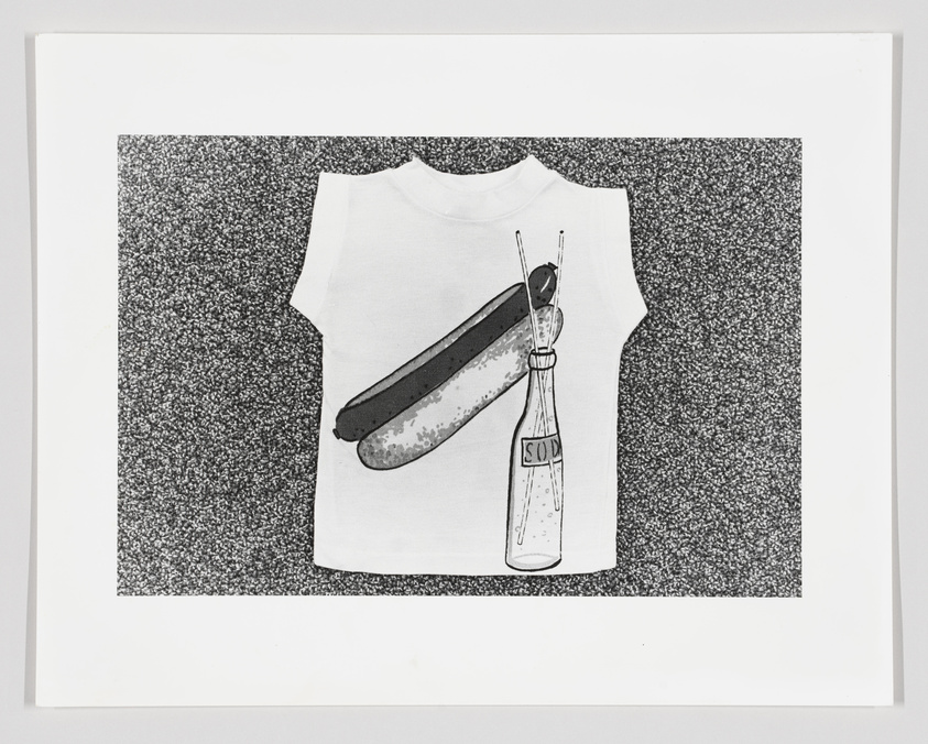 Illustration of a white T-shirt with a hot dog and soda bottle print, framed against a speckled background.