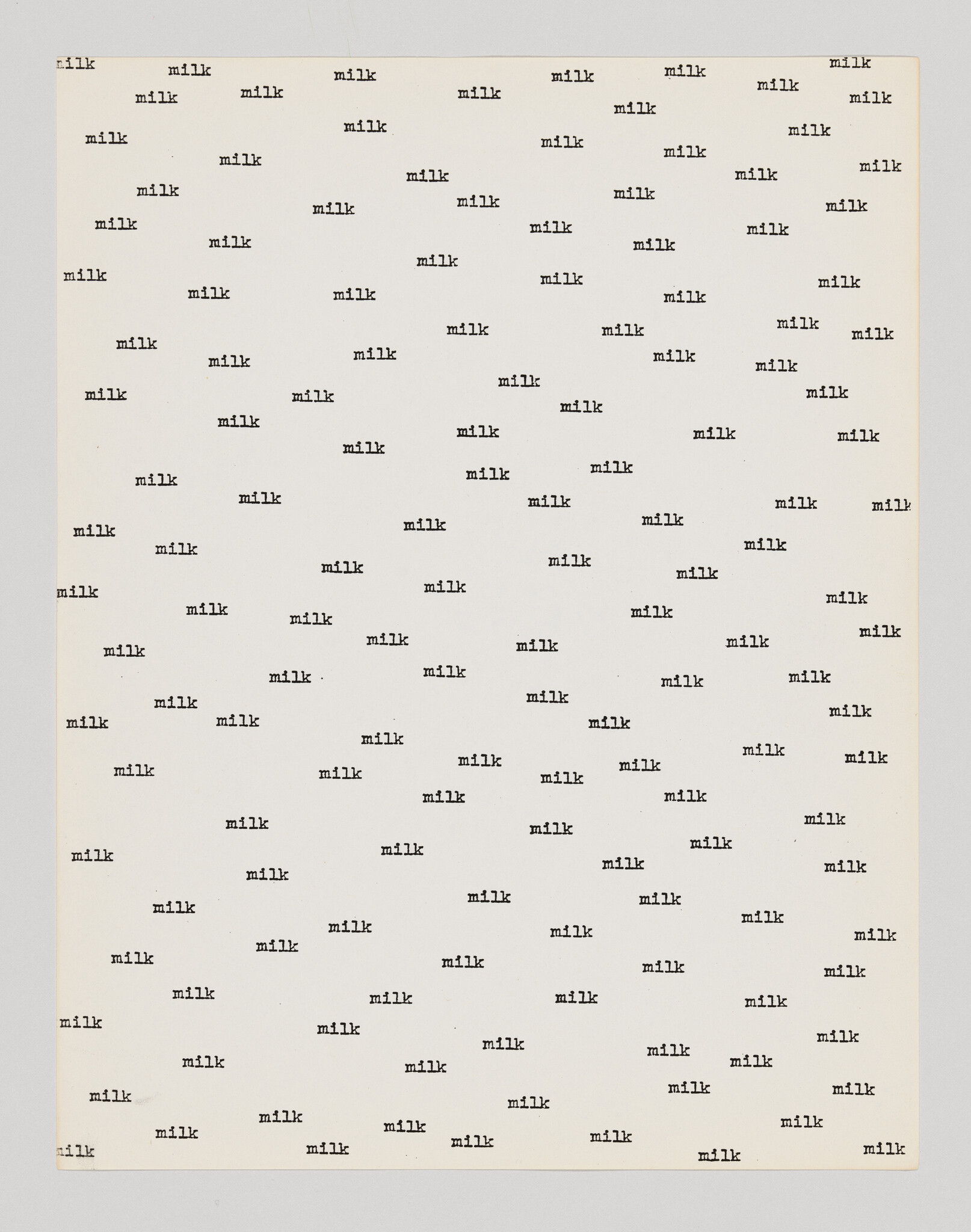 The word "milk" is repeatedly typed in a grid pattern across the entire page.