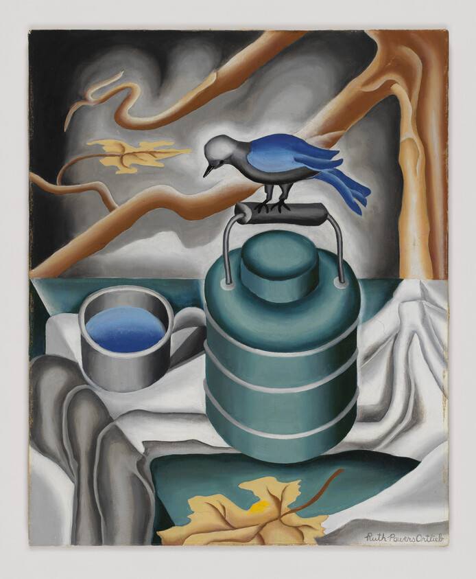 A blue bird perches on the handle of a green metal canister beside a cup.