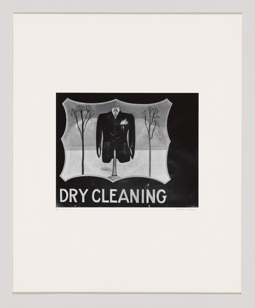 A suit jacket displayed on a mannequin with 'Dry Cleaning' sign beneath it.