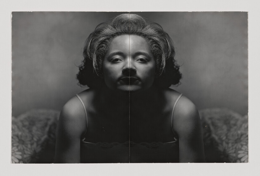 Woman leaning forward with serious expression, dramatic lighting and a vertical seam down the center.