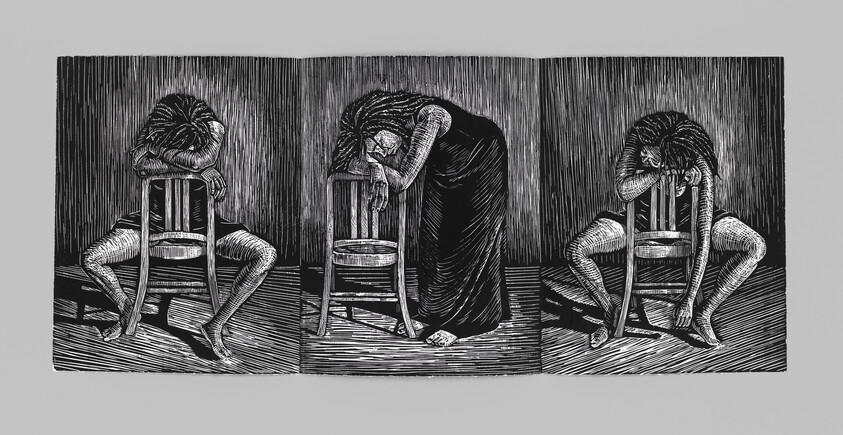 Three figures with heads down rest on chairs, showing tired or sad body language in a dark room.