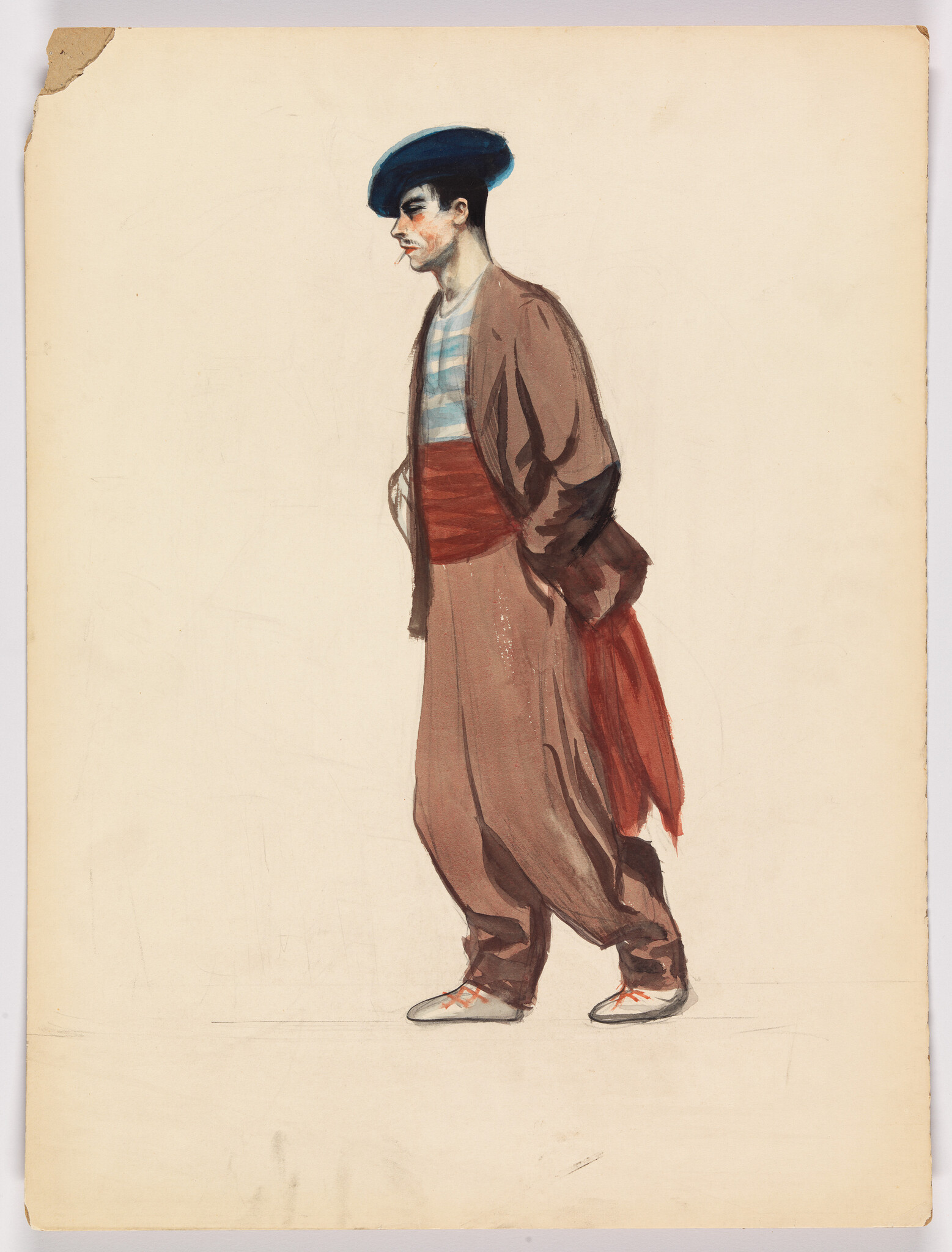 A man in loose brown clothing and a blue beret walks with his hands behind his back.