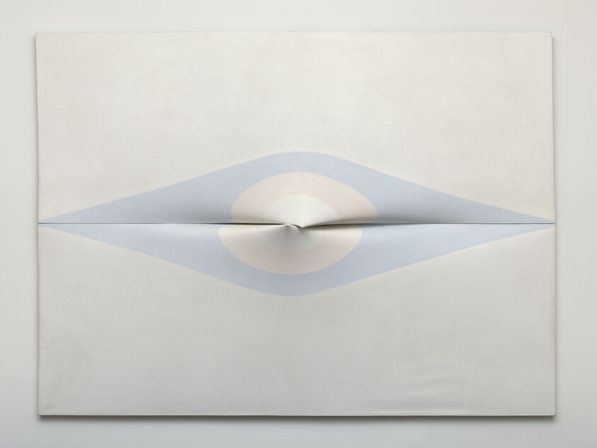 Abstract canvas with a central folded seam forming an eye-like shape in pale blue and beige.