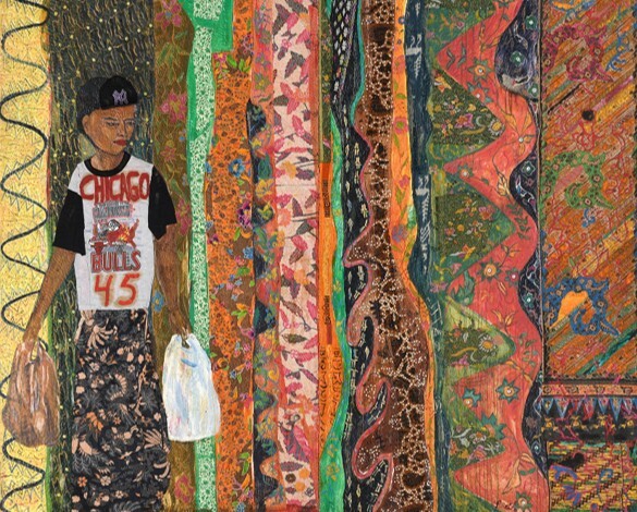 A young person wearing a Chicago Bulls 45 shirt holds two shopping bags beside colorful patterned fabrics.