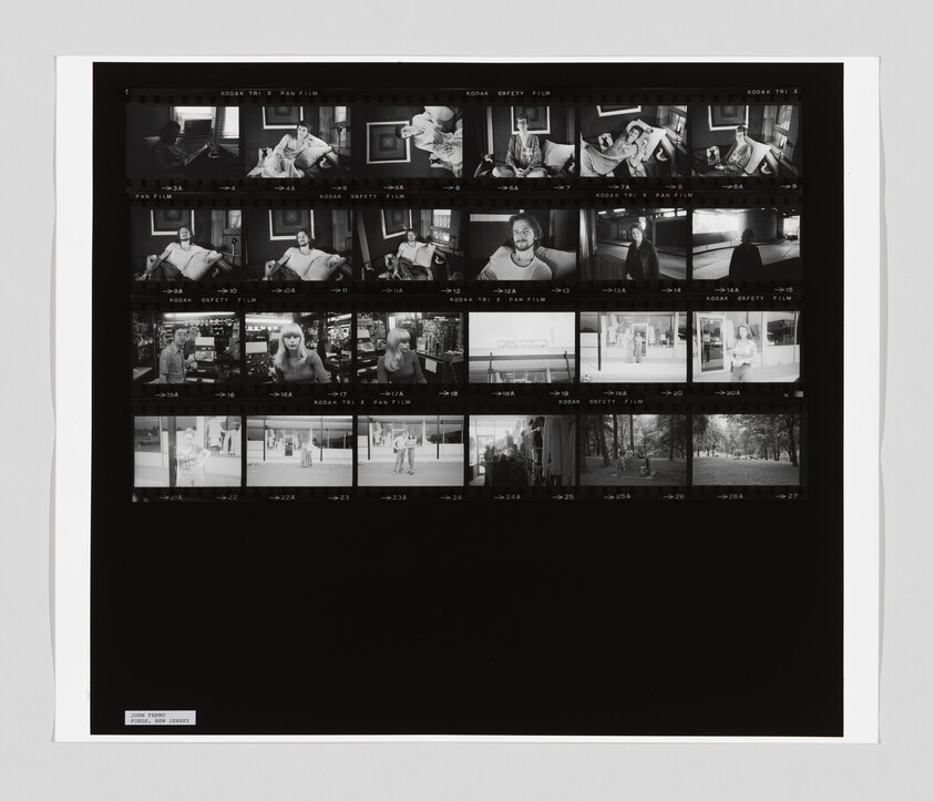 Black-and-white photographic contact sheet showing multiple small portrait and street scene frames on film.