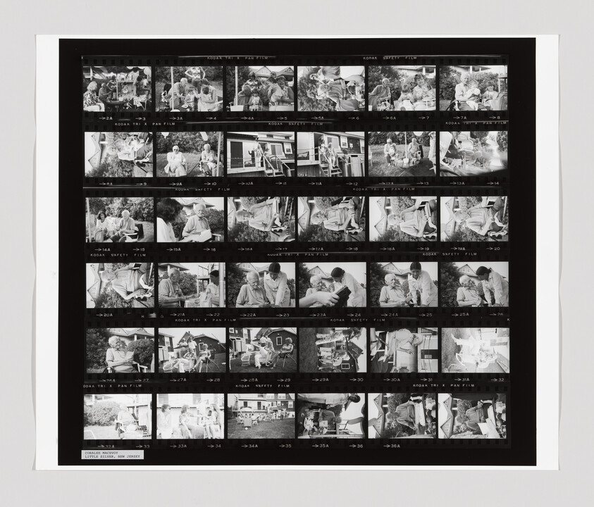 Black-and-white photographic contact sheet showing rows of small frames of people and outdoor scenes.