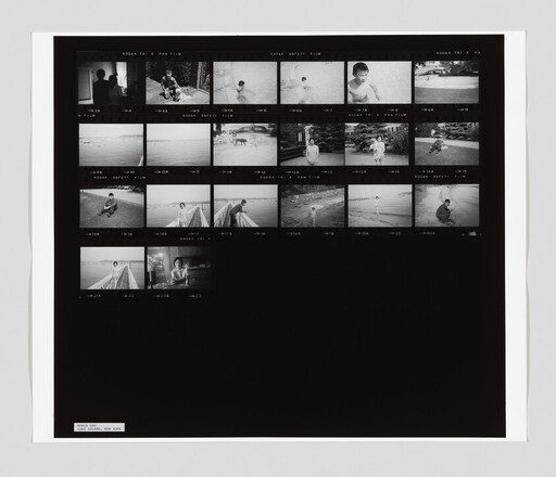 Contact sheet showing multiple black-and-white frames of a child playing at the beach and nearby scenes.